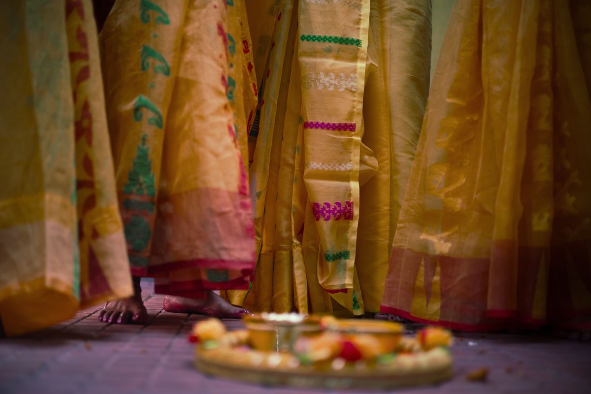 Ivory organza saree with cutwork blouse
